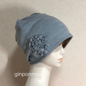 Milling knit hat with corsage